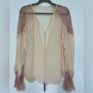 Sheer lace long sleeve blouse.